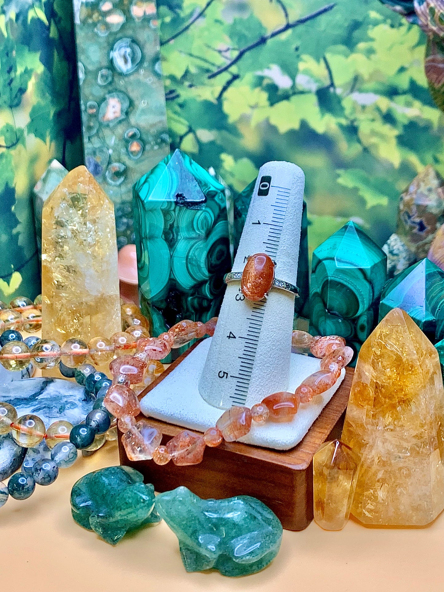 Confetti Sunstone Oval Cut Cabochon Ring set in Sterling Silver