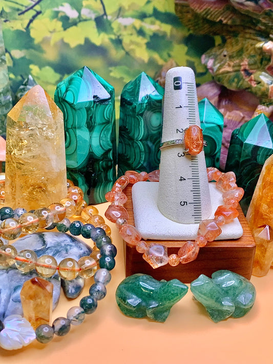 Confetti Sunstone Oval Cut Cabochon Ring set in Sterling Silver