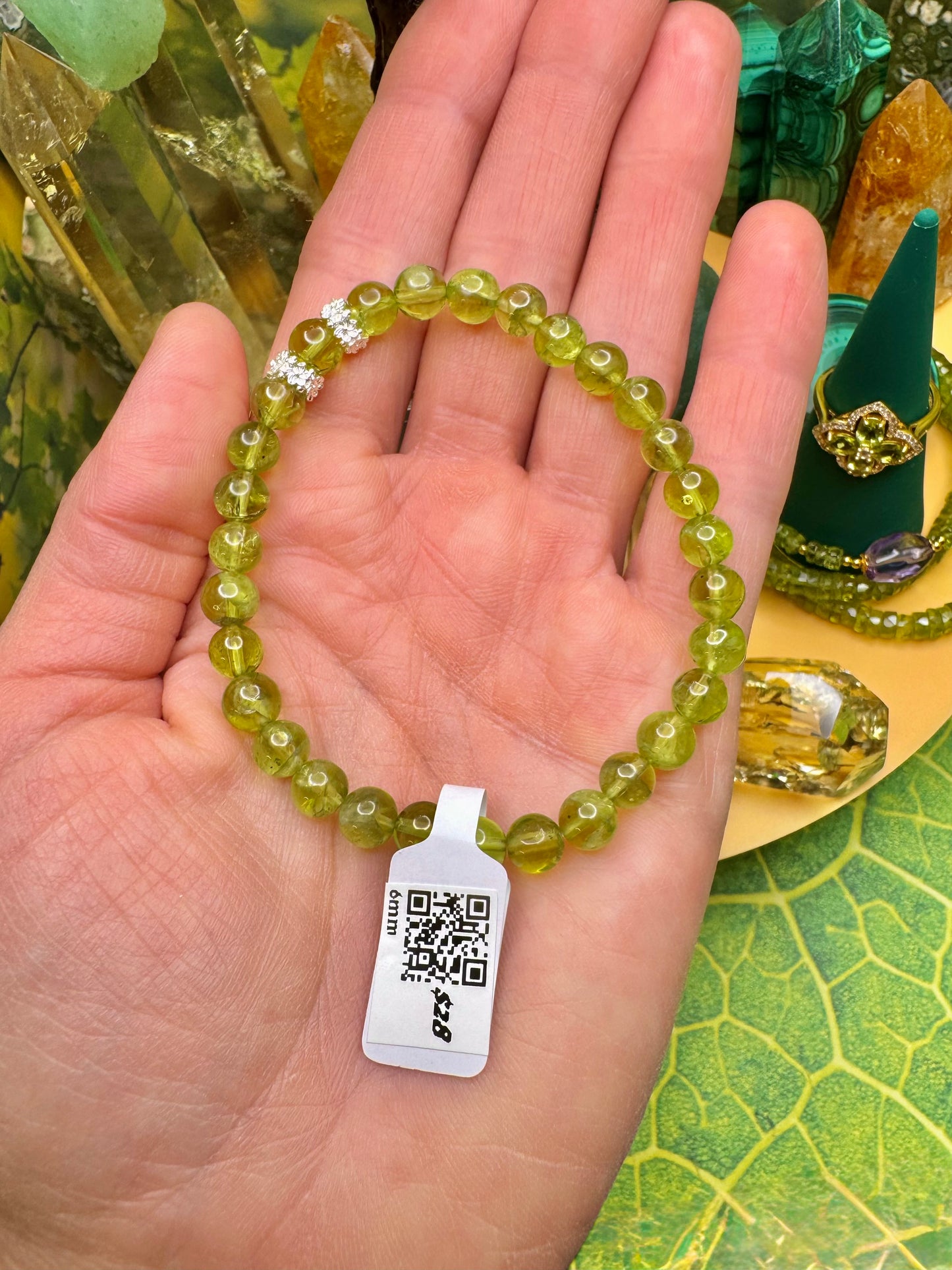 Peridot Round Bead Bracelet with Silver Flower Spacer Accents (6mm)